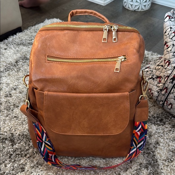 Handbags - Tan Leather Backpack with Flag-Inspired Strap